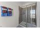 Modern bathroom featuring a glass-enclosed shower with tile surround, and stylish fixtures at 1501 Village Hall Ln # 38, Wake Forest, NC 27587