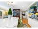 The open kitchen provides an island with seating and ample counter space at 1610 Ridge Rd, Raleigh, NC 27607