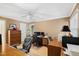 Home office with a ceiling fan, multiple work spaces and good natural light at 1610 Ridge Rd, Raleigh, NC 27607