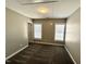 Cozy bedroom with carpet and multiple windows to let in plenty of light at 1618 Brownairs Ln, Raleigh, NC 27610
