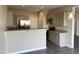 Kitchen featuring stainless steel appliances, granite countertops, and stylish gray cabinetry at 1618 Brownairs Ln, Raleigh, NC 27610