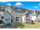 A backyard featuring a patio with table and chairs, surrounded by well-maintained grass at 1725 T W Alexander Dr # 204, Durham, NC 27703