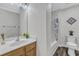 Bathroom featuring a vanity with a sink, a toilet, and a shower-tub combo at 1725 T W Alexander Dr # 204, Durham, NC 27703