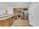 Functional kitchen with stainless steel appliances and hardwood style flooring at 1725 T W Alexander Dr # 204, Durham, NC 27703