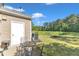 A patio with a metal table and chairs set on a concrete surface at 1725 T W Alexander Dr # 204, Durham, NC 27703