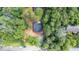A new construction home featuring a dark roof amid lush greenery, and it's ready to become a cozy haven at 1952 Lewis Dr, Burlington, NC 27215