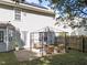 Backyard with a gazebo, furniture, and shade trees in a home listing at 2037 Summer Shire Way, Raleigh, NC 27604