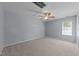 Bedroom features neutral carpet, a ceiling fan and a window for ample natural light at 2037 Summer Shire Way, Raleigh, NC 27604