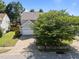Charming two-story home with a two car garage and mature landscaping at 2037 Summer Shire Way, Raleigh, NC 27604