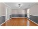 Spacious living room with hardwood floors and ample natural light at 2037 Summer Shire Way, Raleigh, NC 27604