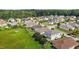 Aerial view of the community showcasing well-maintained homes and green spaces, perfect for Gathering living at 209 S Harrison Place Ln, Fuquay Varina, NC 27526