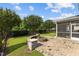 This property offers a screened porch, paved patio and a stone fire pit to expand your outdoor experience at 209 S Harrison Place Ln, Fuquay Varina, NC 27526