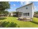 Enjoy this backyard complete with a screened porch and a stone fire pit, great for entertaining guests at 209 S Harrison Place Ln, Fuquay Varina, NC 27526