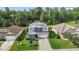 Beautiful home with a well-manicured lawn and garden, set in a peaceful neighborhood at 209 S Harrison Place Ln, Fuquay Varina, NC 27526