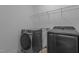 Convenient laundry room equipped with modern washer and dryer set at 209 S Harrison Place Ln, Fuquay Varina, NC 27526