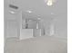 Upstairs loft with carpet and white walls at 209 S Harrison Place Ln, Fuquay Varina, NC 27526