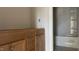 Bathroom featuring a wooden vanity with modern fixtures, alongside a separate shower and toilet area at 216 Sprenger St, Garner, NC 27529