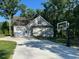 One-story home features a basketball hoop and long driveway at 2471 Golden Forest Dr, Franklinton, NC 27525