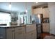 Spacious kitchen boasts a granite island, farmhouse sink, and stainless steel appliances at 2471 Golden Forest Dr, Franklinton, NC 27525