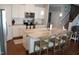 Well-designed kitchen with white cabinets, granite countertops, and a stylish island at 2471 Golden Forest Dr, Franklinton, NC 27525