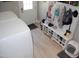 Mud room area featuring washer, door to outside, and shoe storage at 2471 Golden Forest Dr, Franklinton, NC 27525