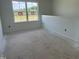 Spacious room featuring a large window that brings in plenty of natural light at 257 Marvel Dr # 135, Rolesville, NC 27571