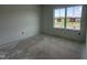 A bright room with a large window providing natural light at 257 Marvel Dr # 135, Rolesville, NC 27571