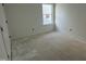 A bright room with a large window providing natural light at 257 Marvel Dr # 135, Rolesville, NC 27571