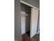 Bedroom closet with white sliding doors and a rod for hanging clothes at 2725 Westchester Dr, Burlington, NC 27217