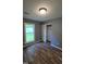 Bedroom with a large window letting in natural light at 2725 Westchester Dr, Burlington, NC 27217