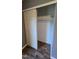 The closet has an open sliding door and rod for hanging clothes at 2725 Westchester Dr, Burlington, NC 27217
