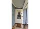 Close-up of the home's front door, showing design details and a welcoming entrance mat at 2725 Westchester Dr, Burlington, NC 27217