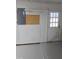 Garage space with door to the exterior and electrical panel at 2725 Westchester Dr, Burlington, NC 27217