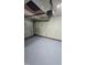 Spacious garage with an American flag hanging from the ceiling at 2725 Westchester Dr, Burlington, NC 27217