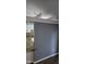 This is a kitchen area with tan counter tops and white cabinets and is partly blocked by a wall at 2725 Westchester Dr, Burlington, NC 27217