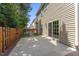 Fenced backyard with concrete patio offers outdoor living space and privacy at 274 Marsh Creek Dr, Garner, NC 27529