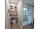 Well-lit bathroom featuring a glass shower, cabinet storage, and modern finishes at 274 Marsh Creek Dr, Garner, NC 27529
