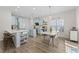 Bright and airy kitchen with ample counter space, stylish cabinetry, and a cozy dining area at 274 Marsh Creek Dr, Garner, NC 27529