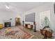 Bright living room featuring a fireplace, media console, and ample space for relaxation and entertainment at 274 Marsh Creek Dr, Garner, NC 27529