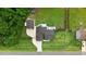 Aerial view of property highlighting the large yard, modern architecture, landscaping, and neighborhood layout from above at 282 Brodie Rose Landing Way, Smithfield, NC 27577