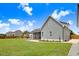 Spacious backyard with screened in porch, patio, and an entertainment area is perfect for outdoor enjoyment at 282 Brodie Rose Landing Way, Smithfield, NC 27577