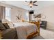 Comfortable bedroom with a unique wood frame bed, natural light, and neutral decor at 282 Brodie Rose Landing Way, Smithfield, NC 27577