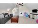 Spacious bonus room with vaulted ceiling, ceiling fan, and multiple activities at 282 Brodie Rose Landing Way, Smithfield, NC 27577