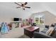 Spacious bonus room with vaulted ceiling, ceiling fan, and room for multiple activities at 282 Brodie Rose Landing Way, Smithfield, NC 27577