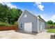 Detached garage with ample parking space and convenient access, adding functionality to the property's exterior at 282 Brodie Rose Landing Way, Smithfield, NC 27577