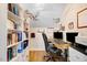 Bright office space with built in bookshelves and a unique, decorative ceiling at 282 Brodie Rose Landing Way, Smithfield, NC 27577