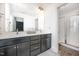 Bathroom features double sinks, vanity with drawers, and a glass-enclosed shower at 283 Daniel Ridge Rd, Wendell, NC 27591
