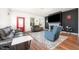 Comfortable living room with a fireplace, modern seating, and an inviting atmosphere at 283 Daniel Ridge Rd, Wendell, NC 27591