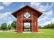Stunning red pavilion, perfect for community gatherings or events in a lush, green park setting at 283 Daniel Ridge Rd, Wendell, NC 27591