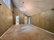 Bedroom with high ceilings, a chandelier, neutral-toned walls, plush carpet and an attached bathroom at 2900 Sylvania Dr, Raleigh, NC 27607